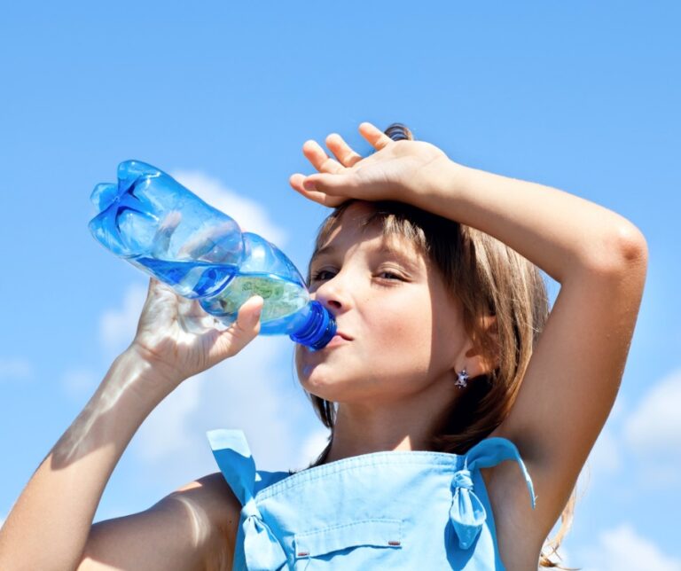 Heat exhaustion picture young girl drinking water picture id486501183